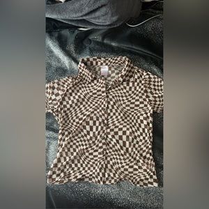 Checkered Collared transparent tee.